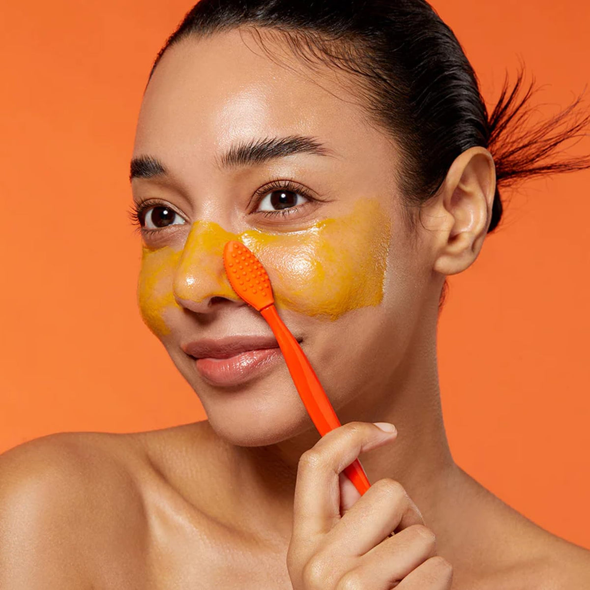 APRILSKIN silicone brush showing Sebum Sweeper Technology