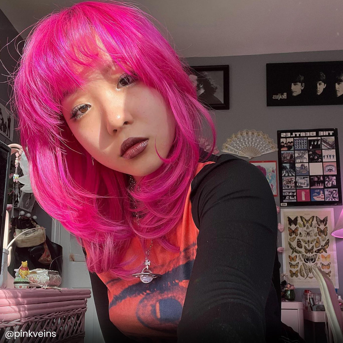 ARCTIC FOX Virgin Pink dye applied on hair strands