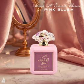 Ard Al Zaafaran Pink Blush Shams Al Emarat Khususi bottle with floral background