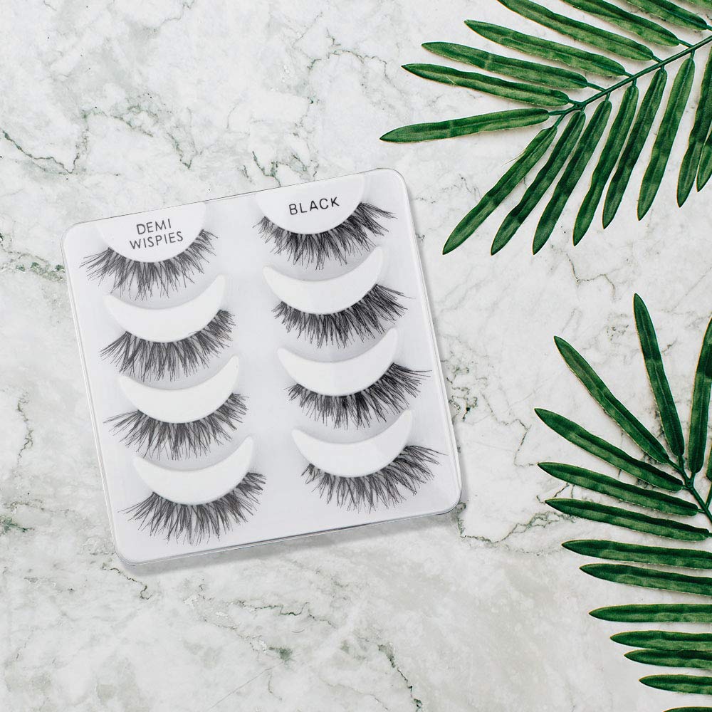 Ardell Demi Wispies Lashes displayed on a makeup table
