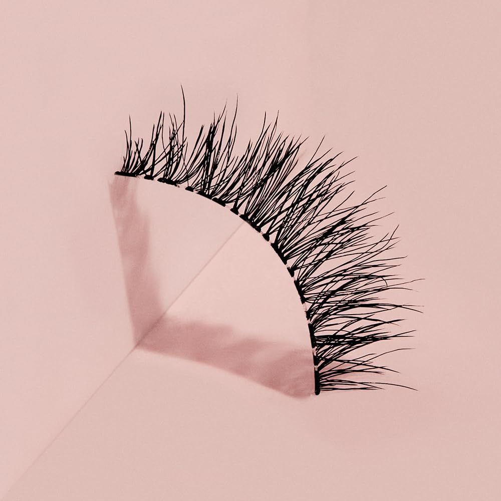 Ardell Naked Lashes 424 in a hand for size reference