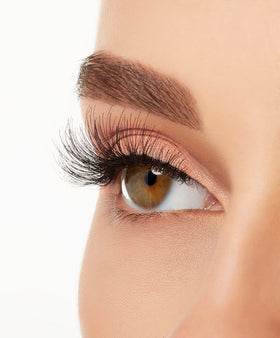 Ardell Wispies 113 lashes displayed on a model