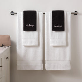 Arkwright towels displayed with skincare products