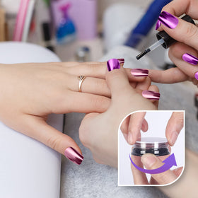 Artdone chrome nail powder applied on black nail polish