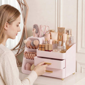 Asdbko Large Capacity Makeup Organizer filled with skincare products
