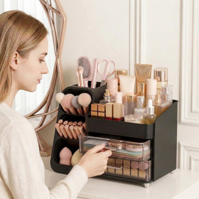Asdbko makeup organizer with makeup brushes and skincare bottles