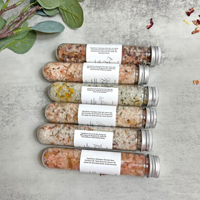 Assorted bath salts with dried flowers