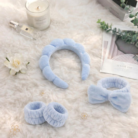 ATROCH headband and wristband set in use during a spa night