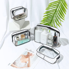 Aucuu Clear Makeup Bags displayed with travel essentials