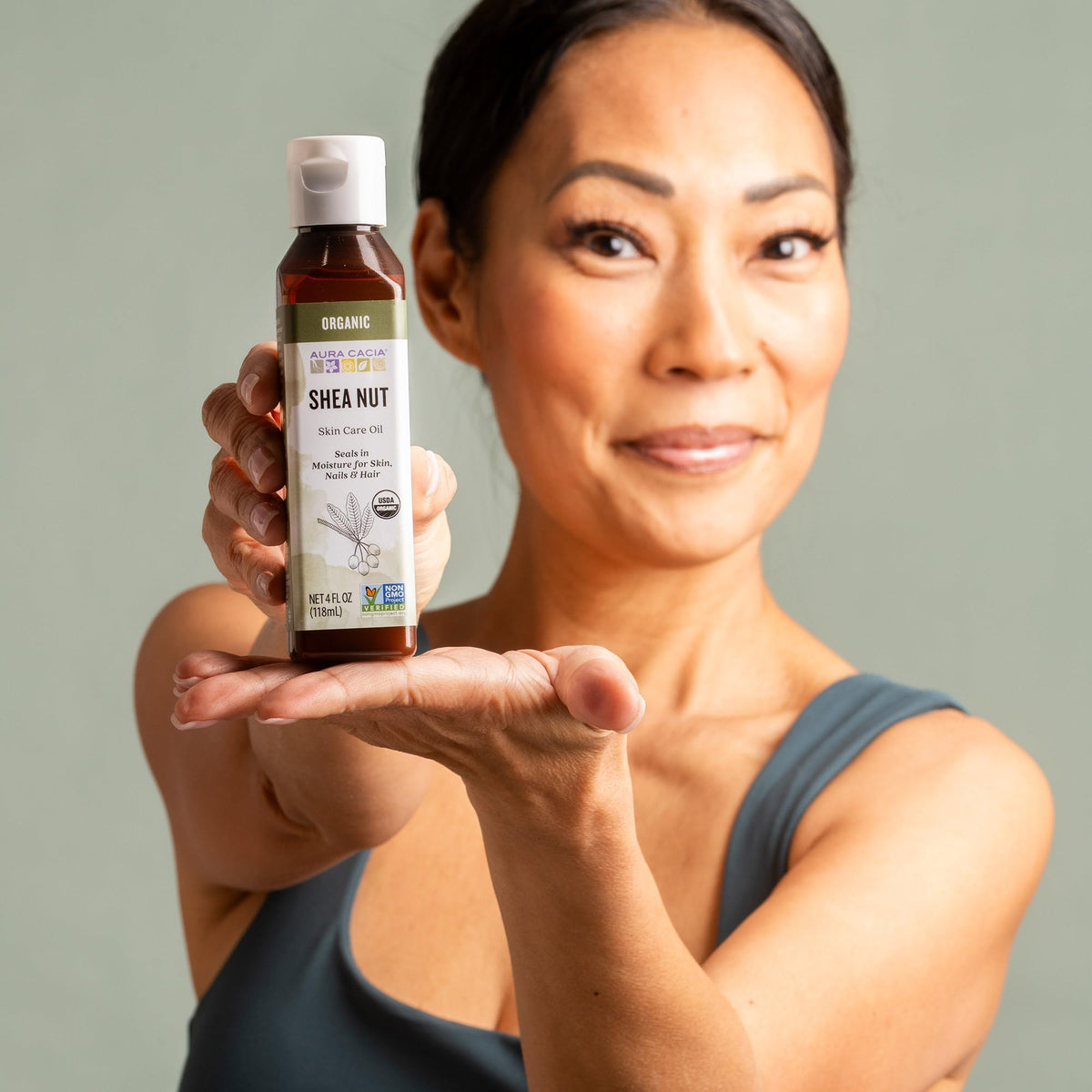 Aura Cacia Organic Shea Nut Oil in a skincare routine setup