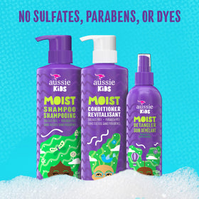 Aussie Kids hair care products with tropical background