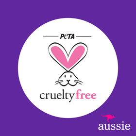 Aussie Kids Moist Detangler Spray application on hair