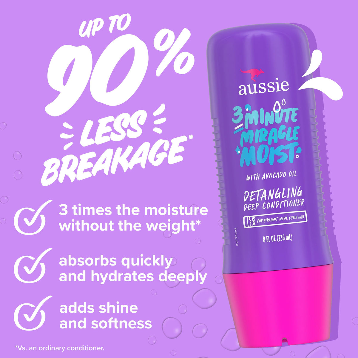 Aussie Total Miracle Shampoo and Conditioner set on a bathroom shelf