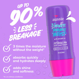 Aussie Total Miracle Shampoo and Conditioner set on a bathroom shelf