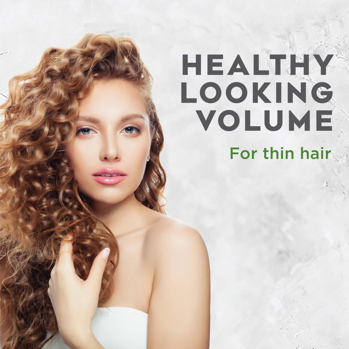 Avalon Organics Volumizing Rosemary Shampoo in a bathroom setting