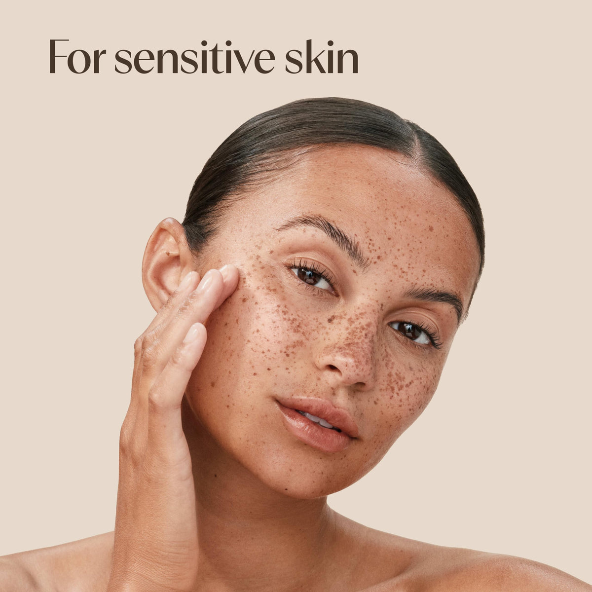 Aveeno Calm + Restore Foaming Cleanser in a bathroom setting