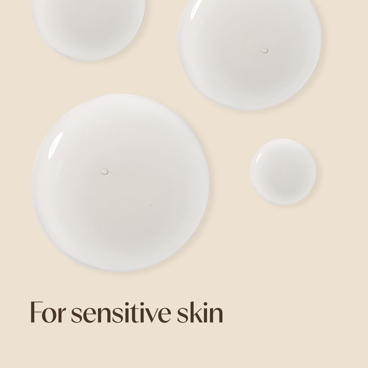 Aveeno Calm + Restore Triple Oat Face Serum on a bathroom shelf