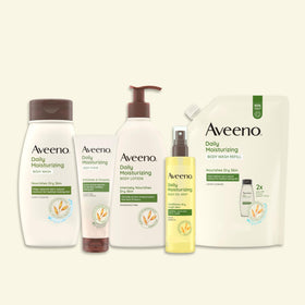 Aveeno Daily Moisturizing Body Oil Mist in use on skin