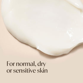 Aveeno Daily Moisturizing Cream on a bathroom counter