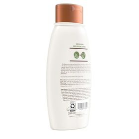 Aveeno Oat Milk Blend Shampoo in a bathroom setting