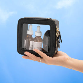 Aveniee Clear Makeup Bag on a vanity with makeup items