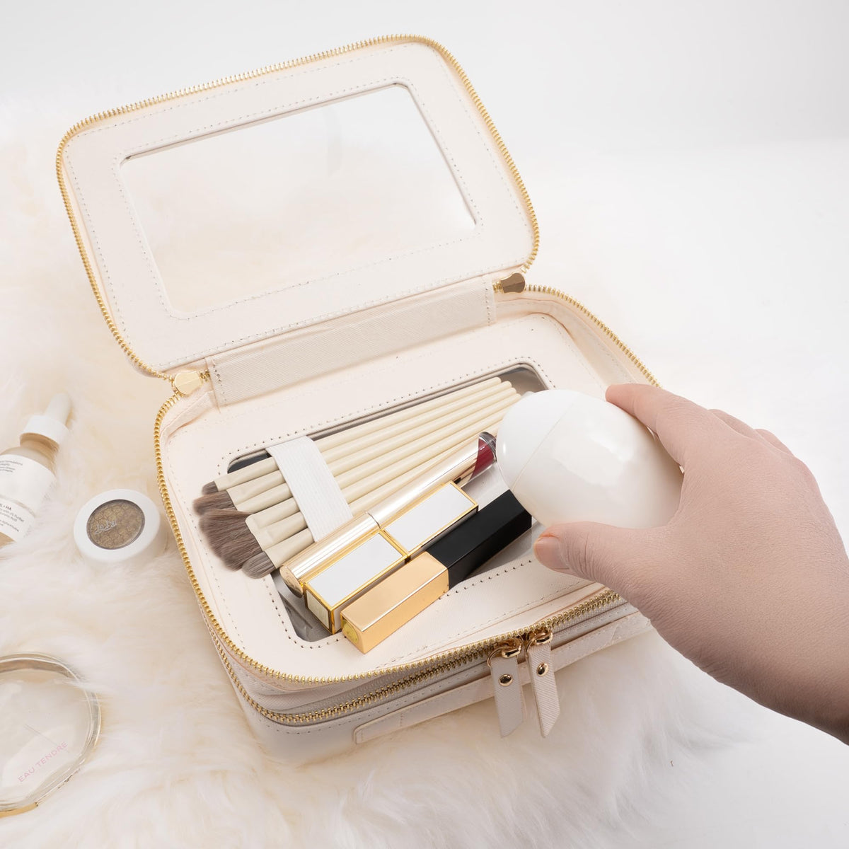 Aveniee Clear Makeup Bag open view displaying organized makeup and brushes