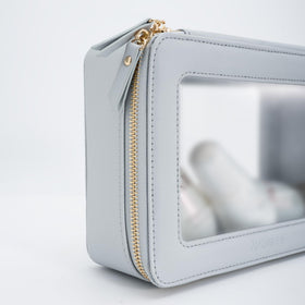 Aveniee Clear Makeup Bag Organizer displayed with cosmetics