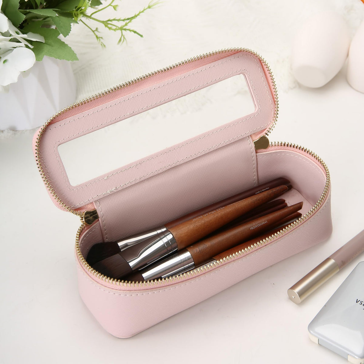 Aveniee Clear Makeup Brush Bag with cosmetics and accessories