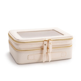 Aveniee Large Clear Makeup Bag beside a bathroom sink with cosmetics