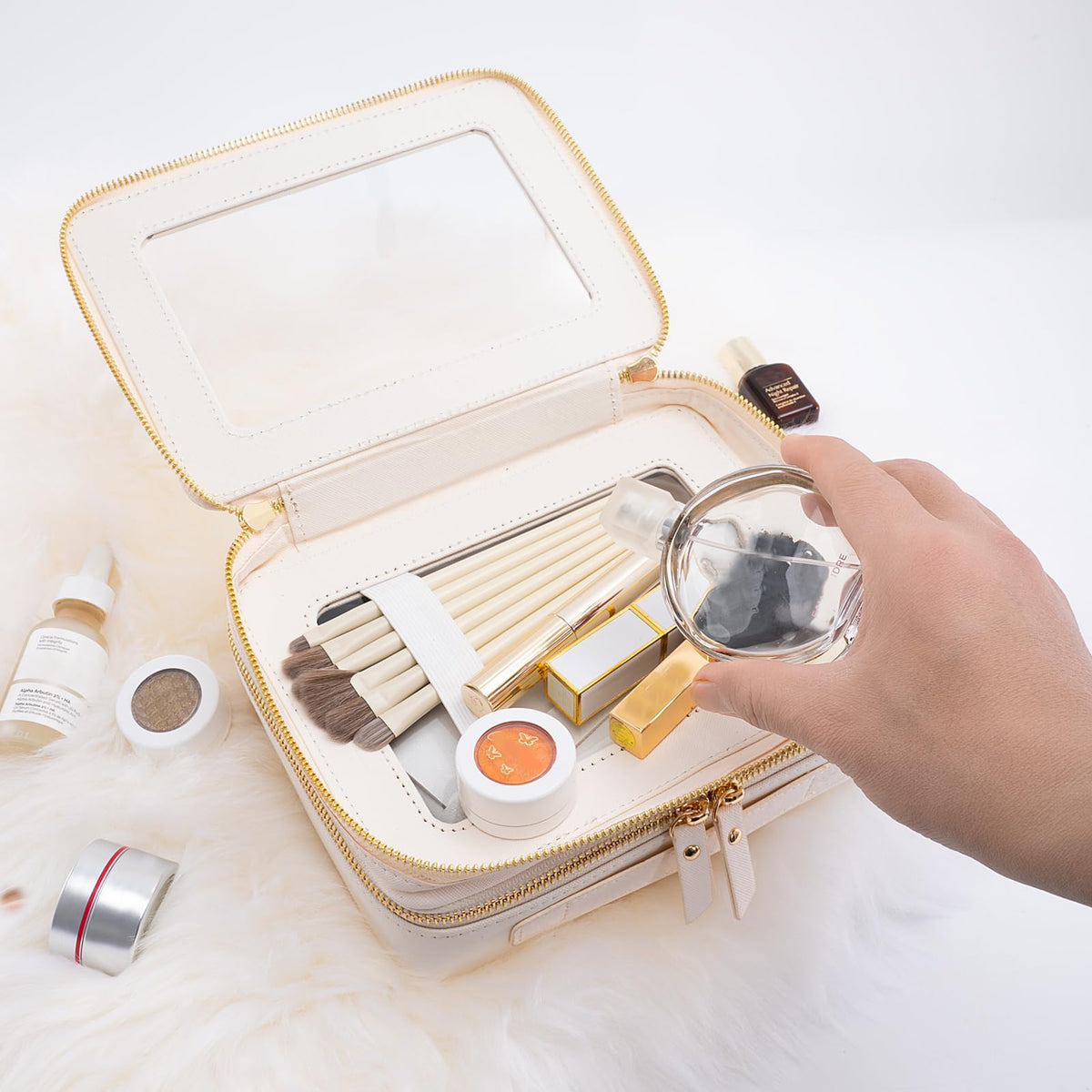 Aveniee Large Clear Makeup Bag displaying cosmetics in the lower compartment