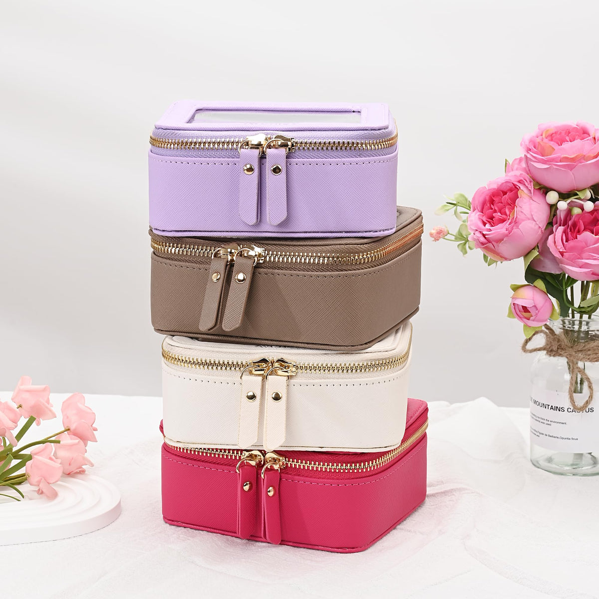 Aveniee Mini Clear Makeup Bag beside beauty products