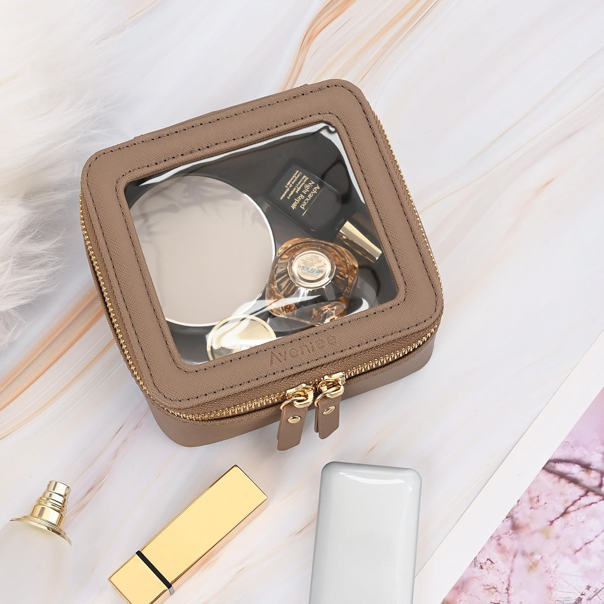 Aveniee Mini Clear Makeup Bag on travel counter
