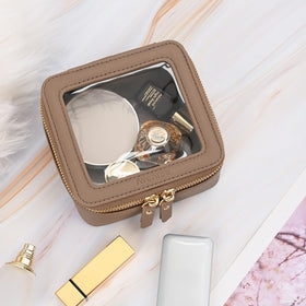 Aveniee Mini Clear Makeup Bag on travel counter