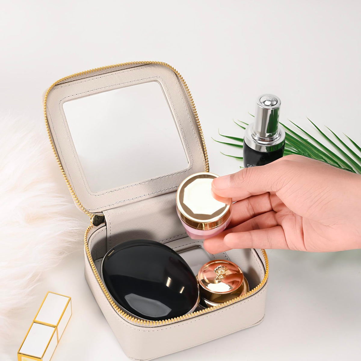 Aveniee Mini Clear Makeup Bag open with cosmetics inside