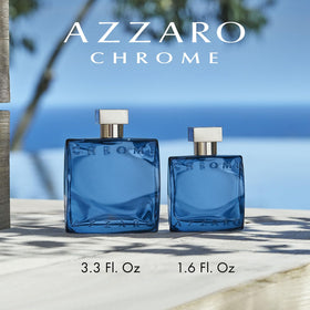 Azzaro Chrome Parfum bottle on a wooden table