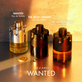 Azzaro The Most Wanted Parfum 5.07 Fl Oz bottle with floral background