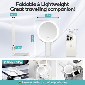 B Beauty Planet 30x/1x Magnifying Travel Mirror on tabletop with warm light