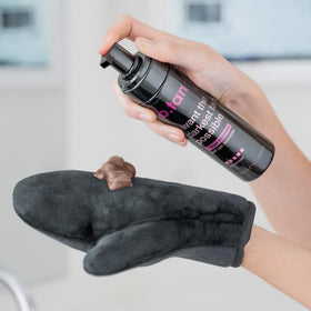 B.TAN tanning products displayed together