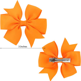 Babymatch alligator clip with grosgrain ribbon bow close-up