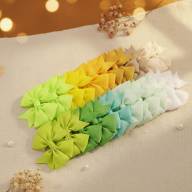 Babymatch Baby Hair Bows Clips displayed on a table