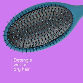 Back view of Conair detangling brush showing cushioned base