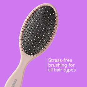 Back view of Conair Detangling Hair Brush with easy-grip handle