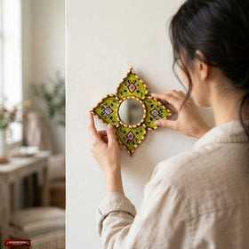 Back view of DecorContreras wall mirror with mounting hardware