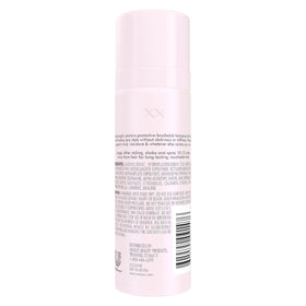 Back view of Nexxus Comb Thru Hairspray 1.5 oz bottle