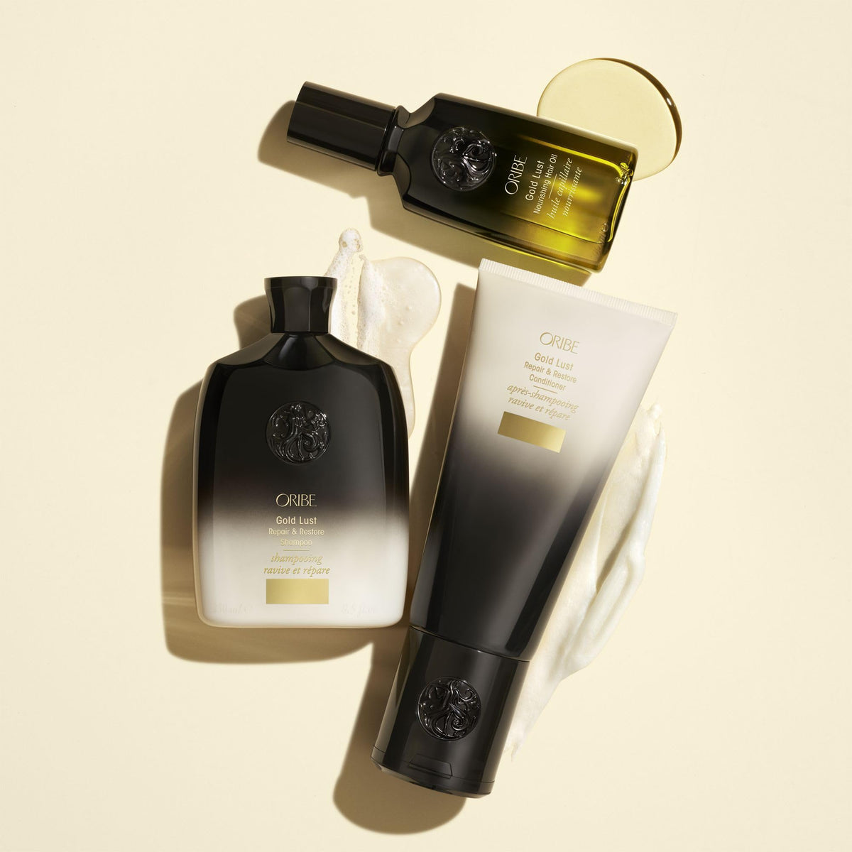 Back view of ORIBE Gold Lust Hair Oil packaging