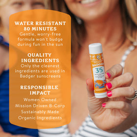 Badger Kids sunscreen stick being applied to a child's face