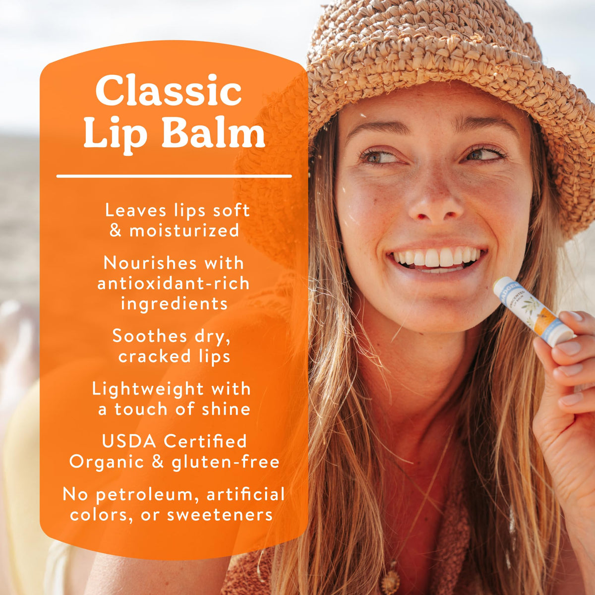 Badger Tangerine Breeze Organic Lip Balm tube close-up