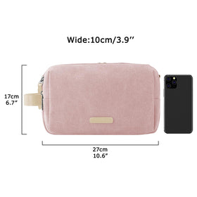 BAGSMART Toiletry Bag in lifestyle setting with travel items