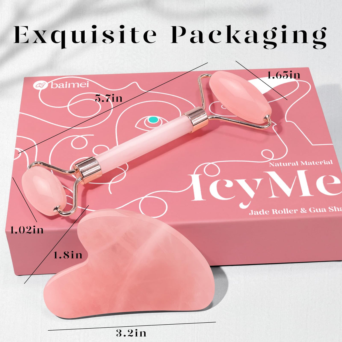 BAIMEI Rose Quartz Roller and Gua Sha set on a vanity