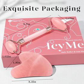 BAIMEI Rose Quartz Roller and Gua Sha set on a vanity